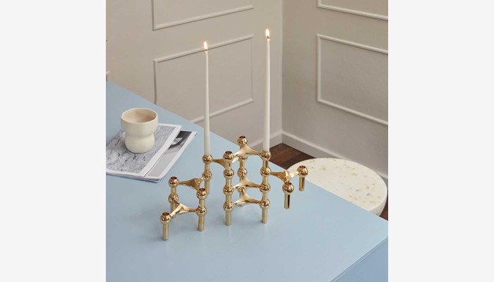 lifestyle_candle holder and off white taper candles_solid brass